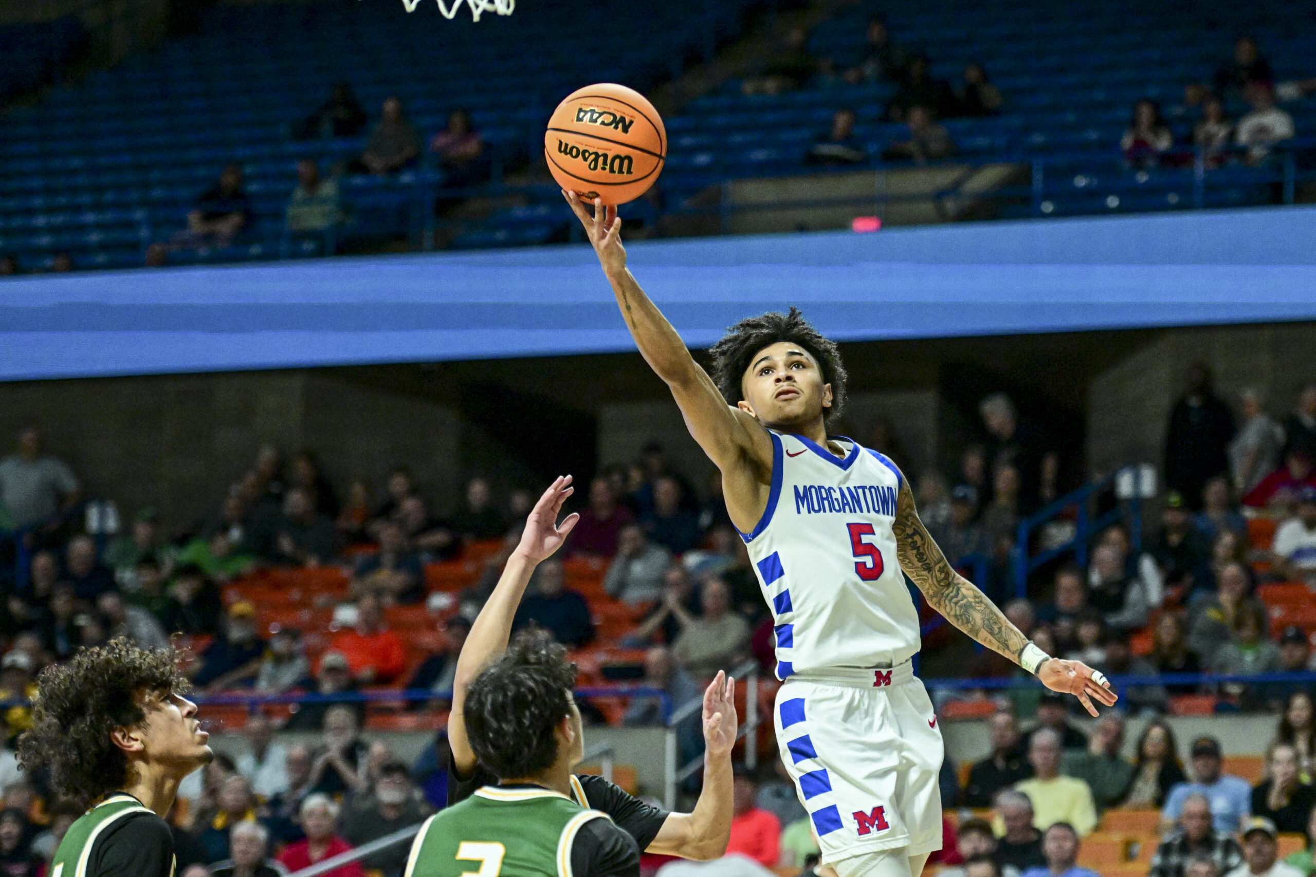 Young scores 32 to lead Morgantown past Huntington and into Class AAAA title game